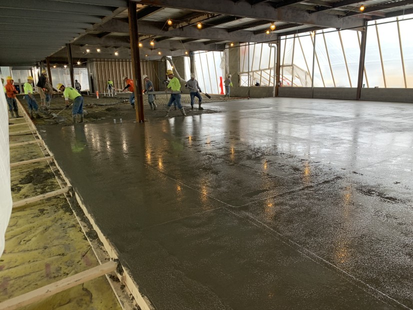 Installation of concrete barrier over PCB contaminated slab